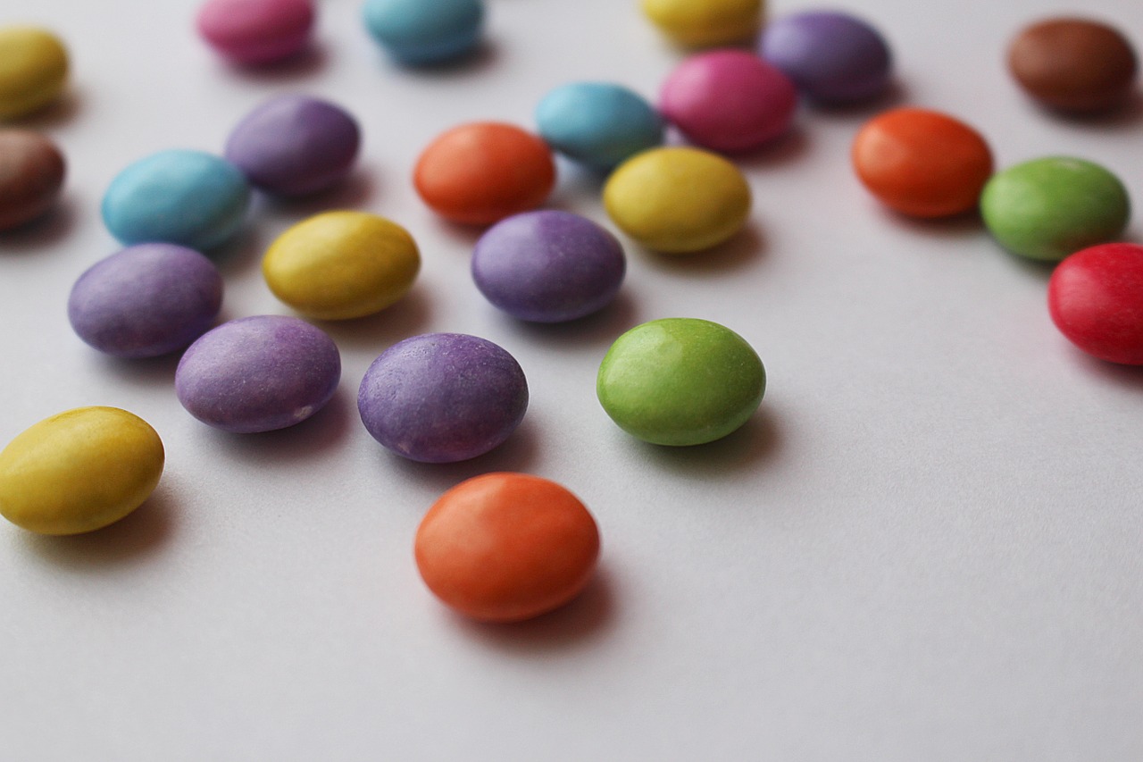 Pieces of candy on table