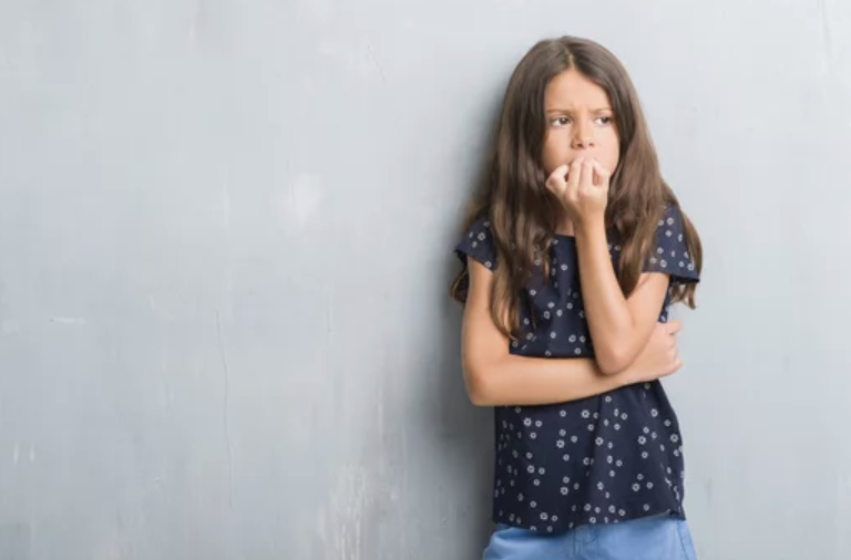 all alone Anxious Child biting her nails.