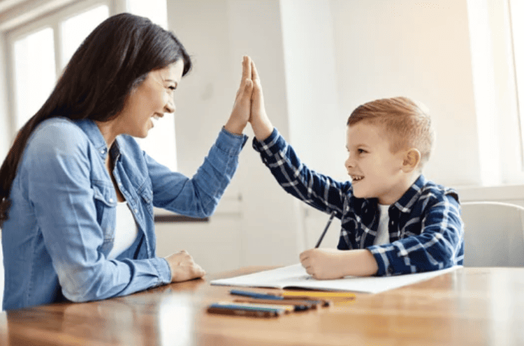 ADHD Tutor helping ADHD child with homework