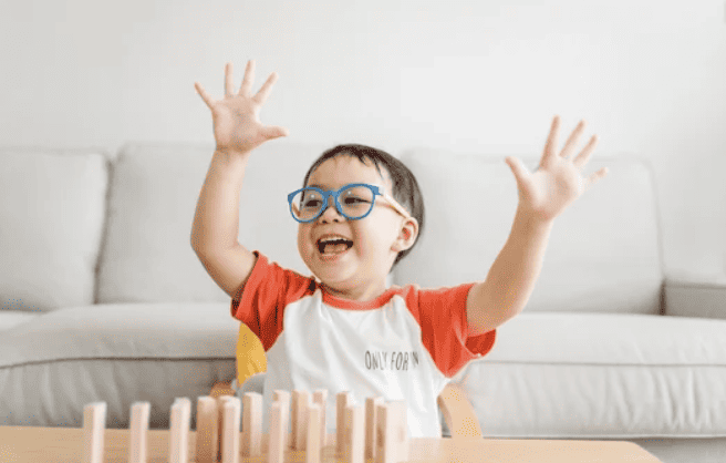 happy Child dressed as superhero